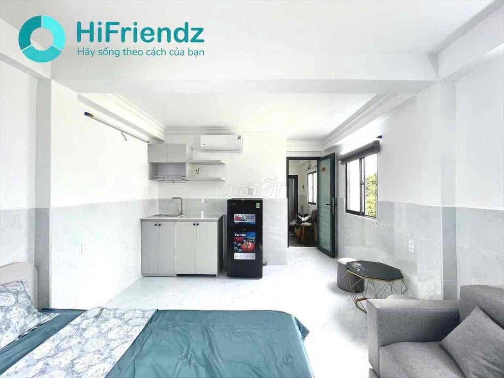 mini apartment's right on Phan Xích Long near the center.