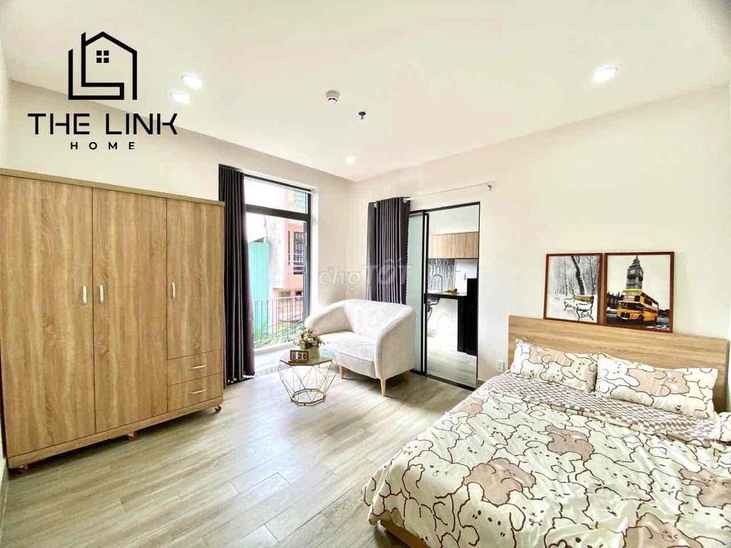 A kitchen bedroom with a balcony.