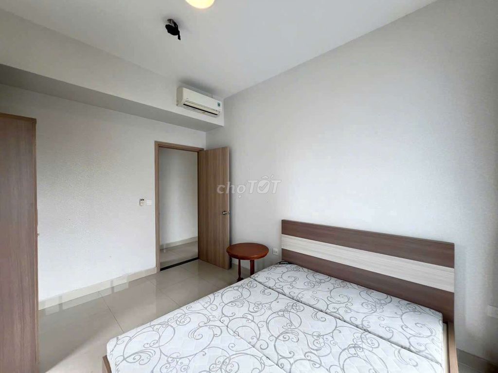 either in two bedrooms. A Novaland Botanica Premier.