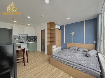 Tell Zhang the new studio is 100% right near Trường Chinh near District 12 hospital.