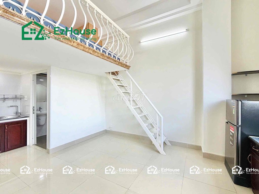 The service apartment is next totte Mart -- the super cool elevator building.