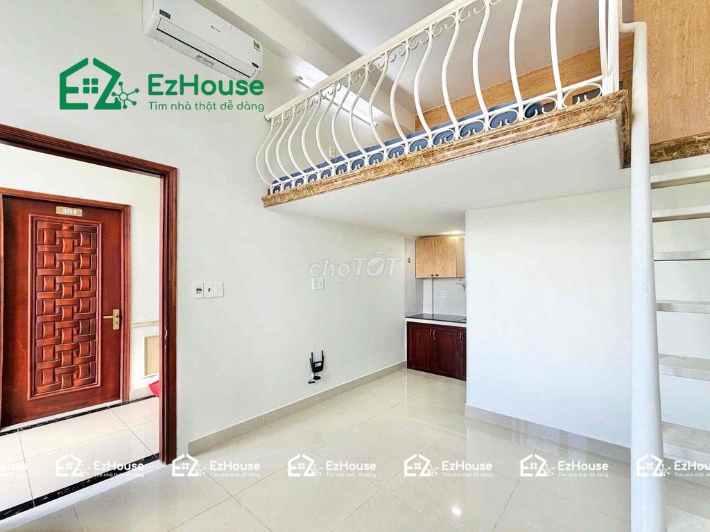 The service apartment is next totte Mart -- the super cool elevator building.
