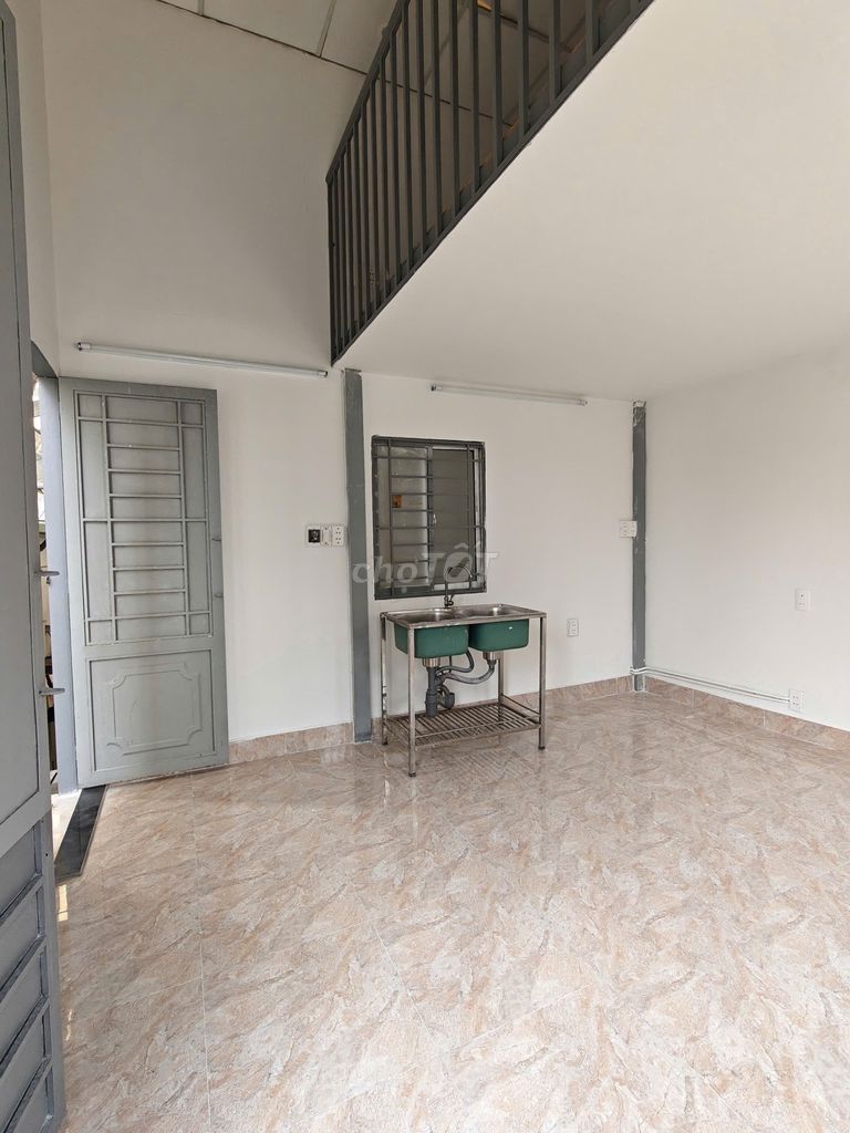 The new room has the balcony, many windows, very open near the Literal Way.