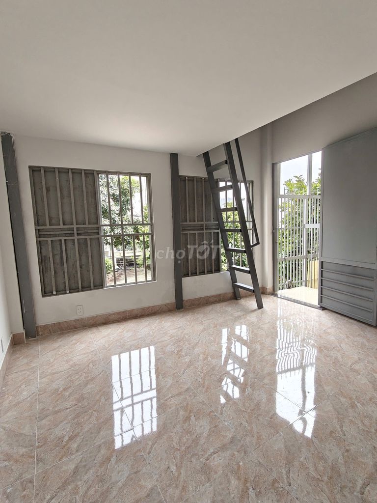 The new room has the balcony, many windows, very open near the Literal Way.