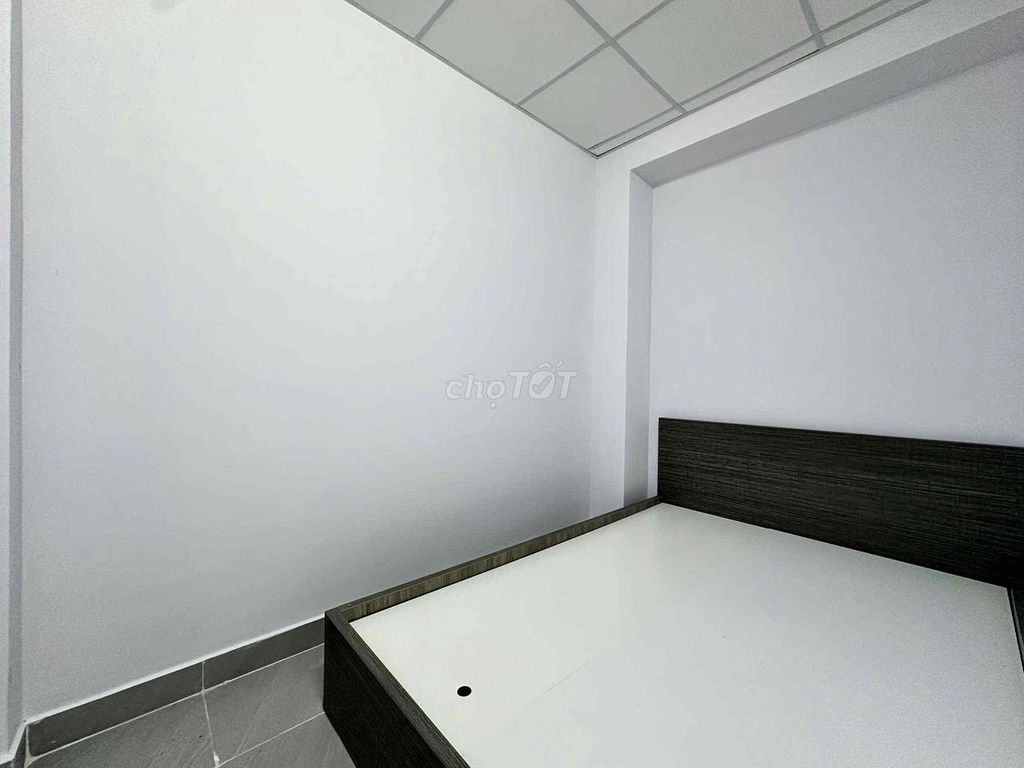 The mini apartment. One bedroom, wide open kitchen under ground.