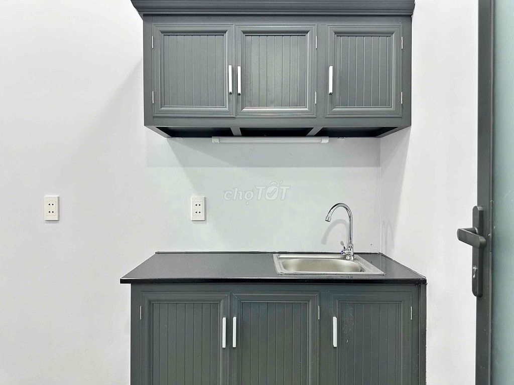 The mini apartment. One bedroom, wide open kitchen under ground.