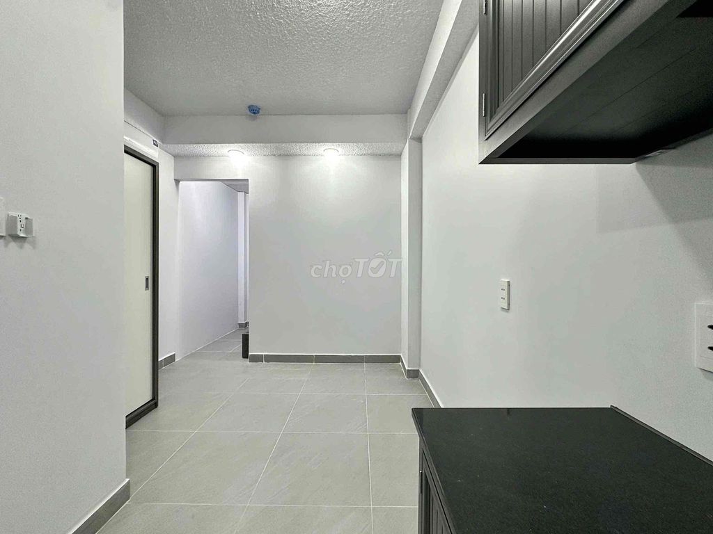 The mini apartment. One bedroom, wide open kitchen under ground.