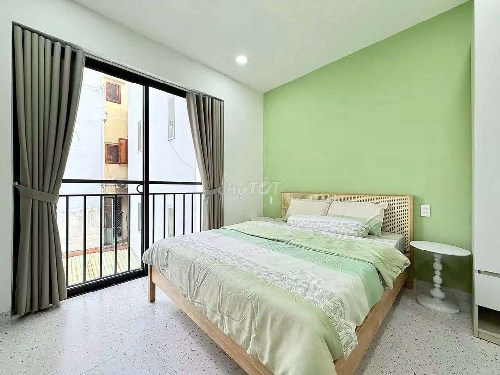 Rent a mini apartment, super open balcony, near a short bridge.
