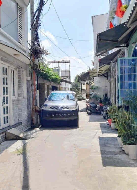 The original house. Car alley. Two doors from the front.