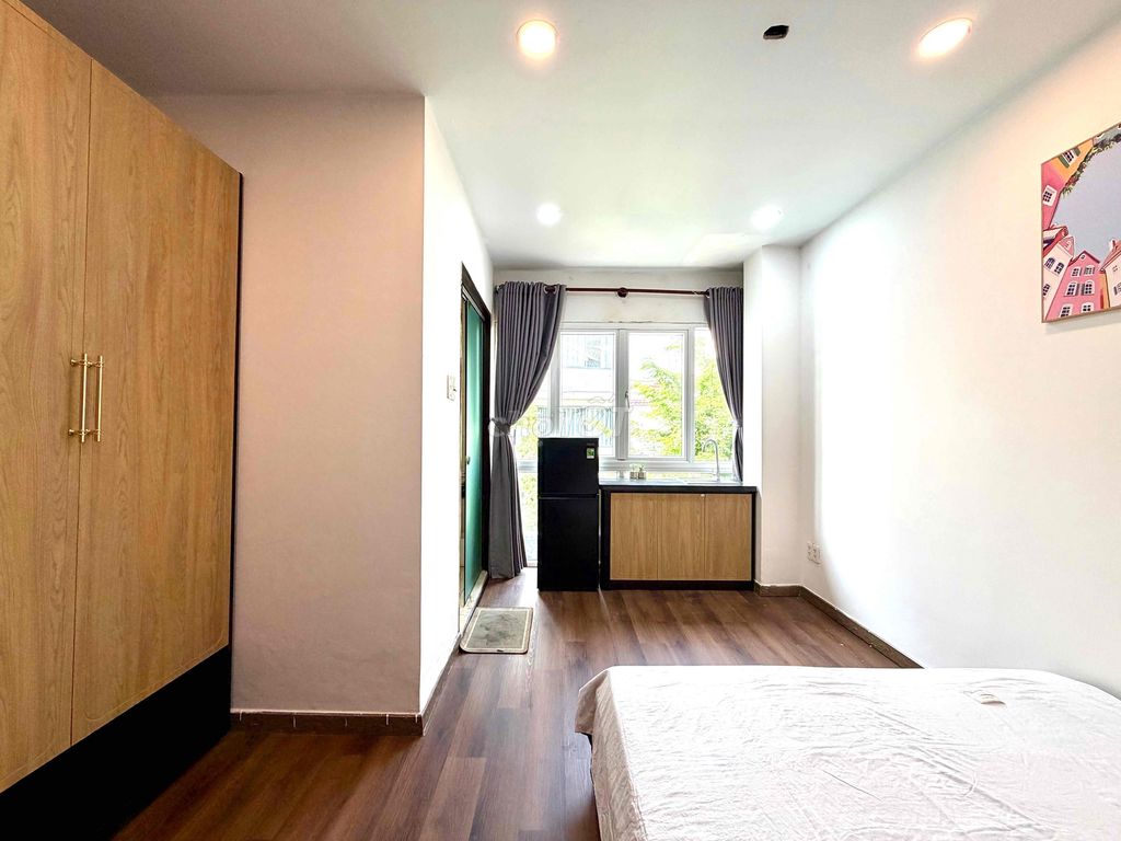 It's the owner who rented the new mini apartment that looks like the most modern airport.