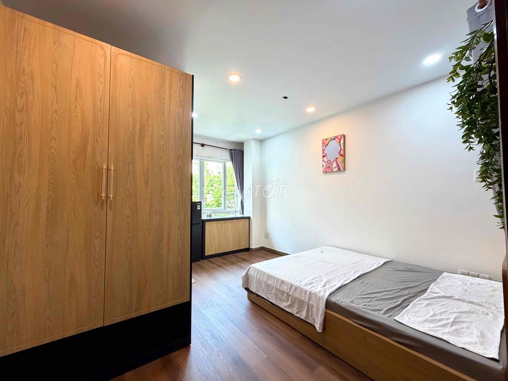 It's the owner who rented the new mini apartment that looks like the most modern airport.