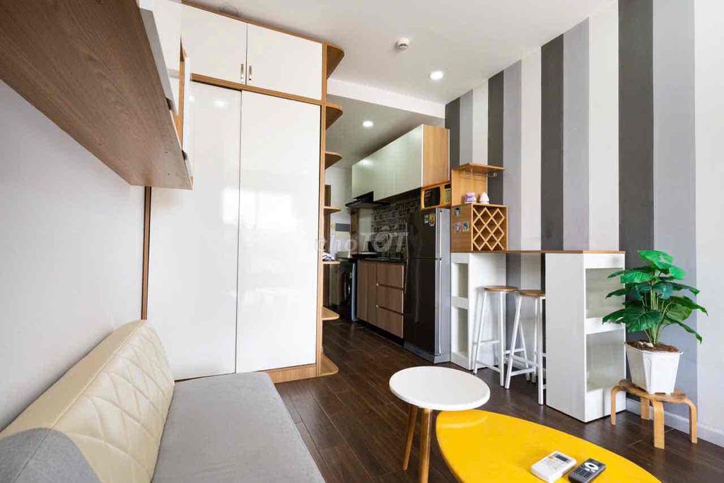 The studio apartment has a full balconies. Masteri Millennium.