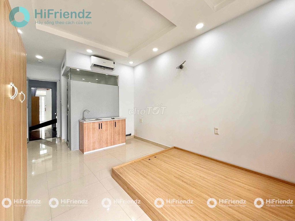 The balcony studio is full of furniture at the center.