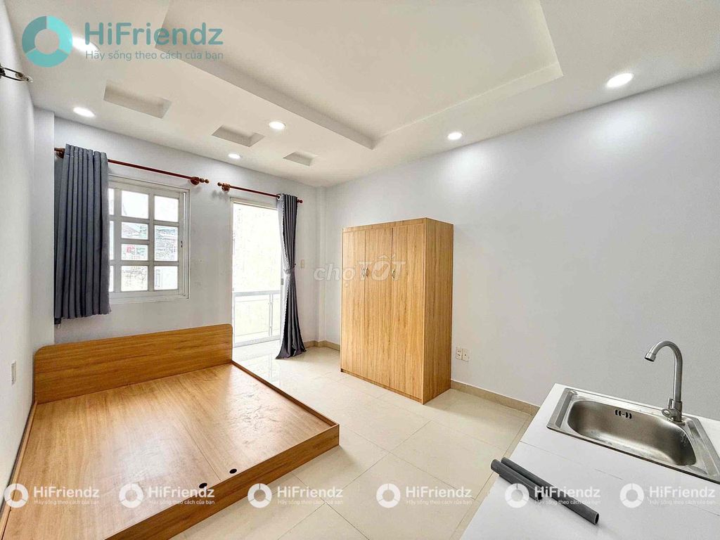 The balcony studio is full of furniture at the center.