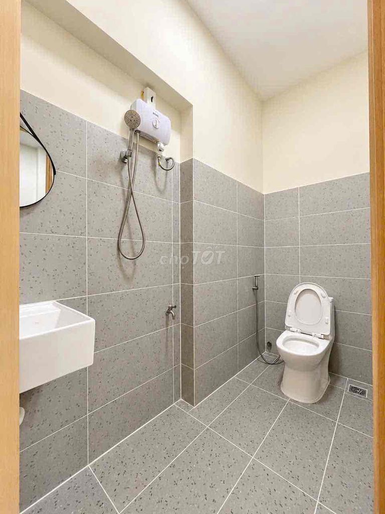 A new kitchen is open in a balcony bedroom.
