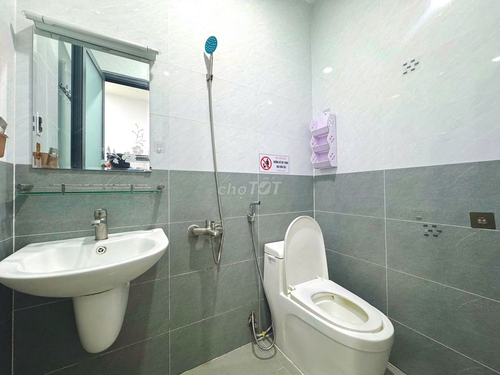 mini apartments close to five dog cages and industrial colleges.