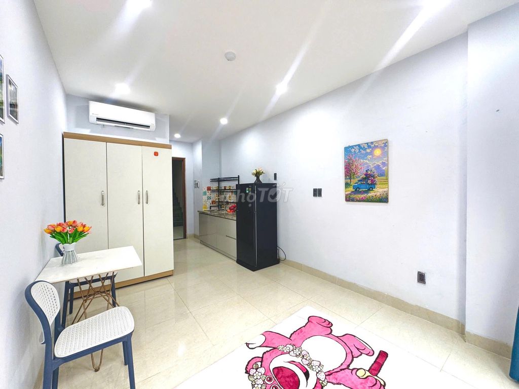 mini apartments close to five dog cages and industrial colleges.