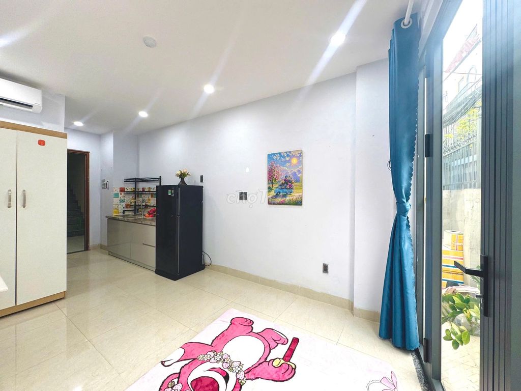 mini apartments close to five dog cages and industrial colleges.