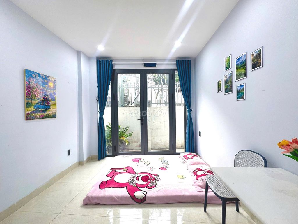 mini apartments close to five dog cages and industrial colleges.
