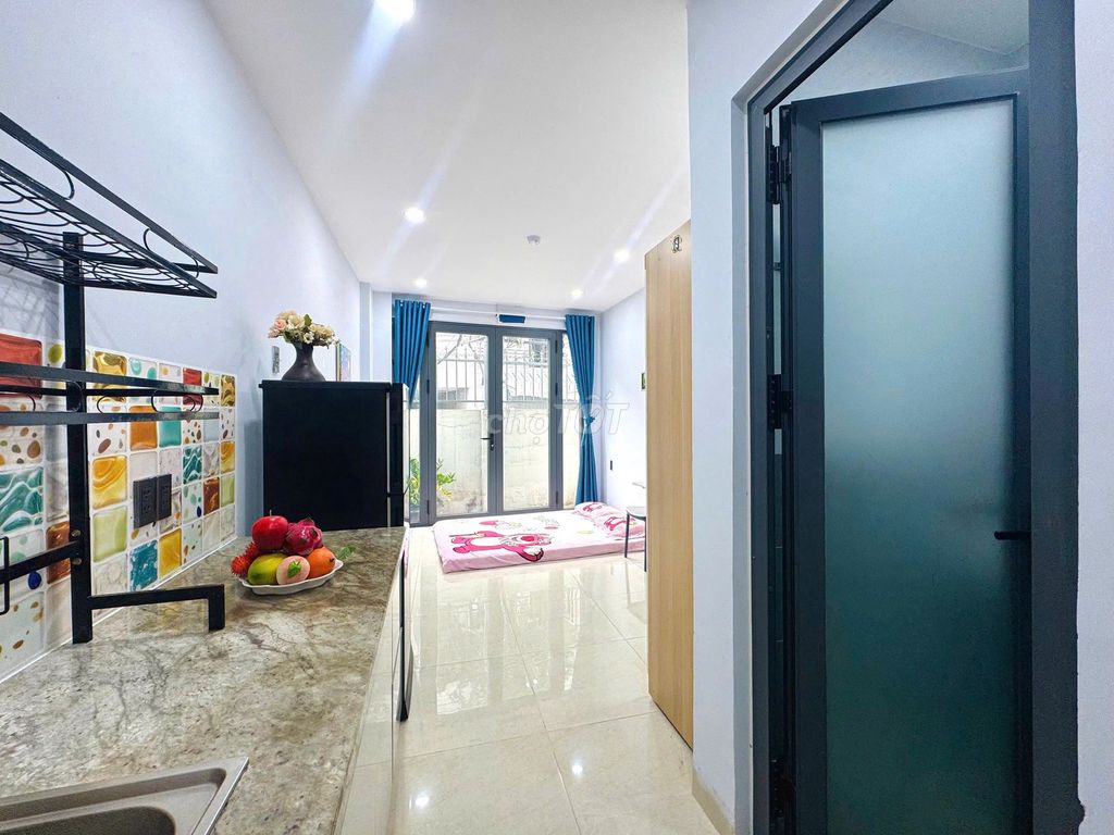 mini apartments close to five dog cages and industrial colleges.