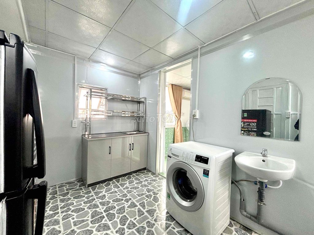 A full-in-house kitchen with its own washing machine near lotte pmh tdt