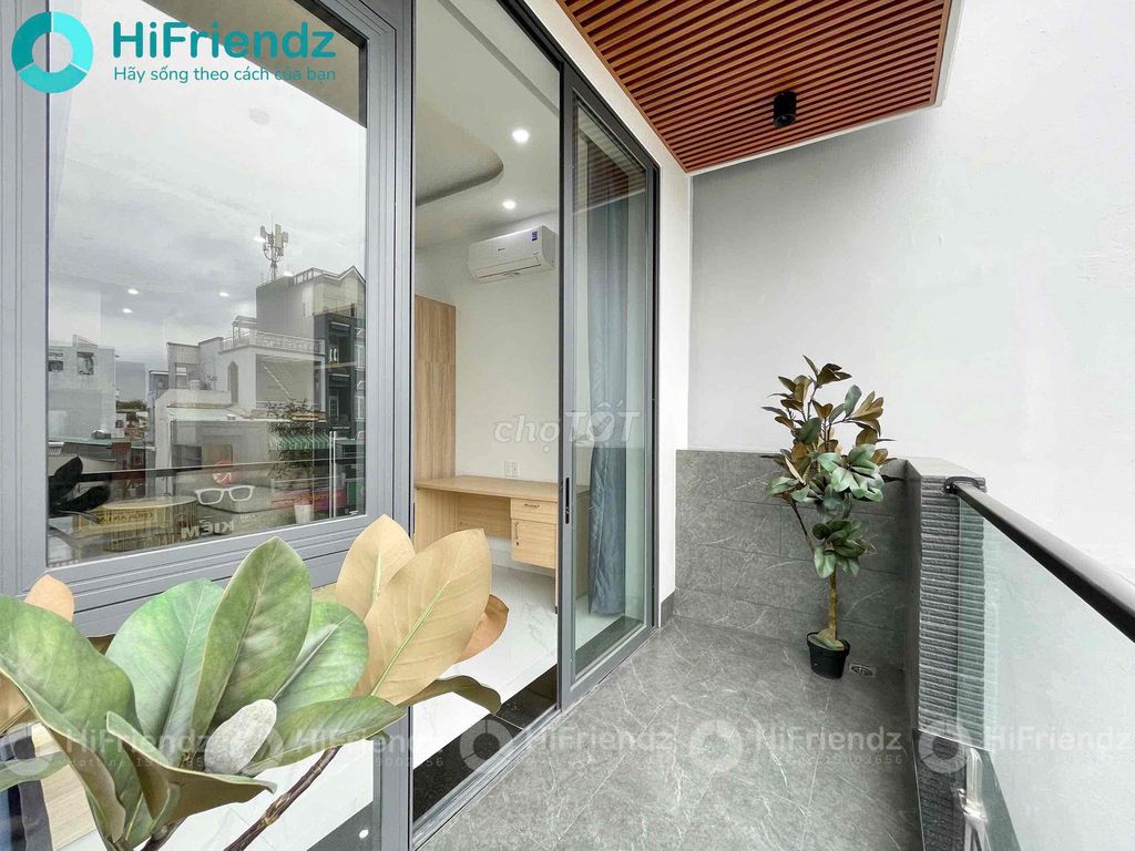 The studio is eight rooms full of furniture in a service apartment building.