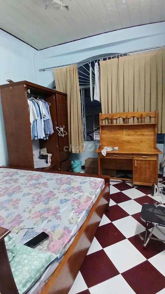 The original house. It's 100 percent real. Two bedrooms. Two toilets. Nơ Trang Long. B. Happy