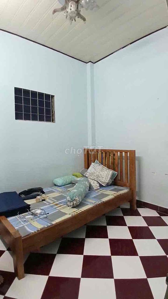 The original house. It's 100 percent real. Two bedrooms. Two toilets. Nơ Trang Long. B. Happy