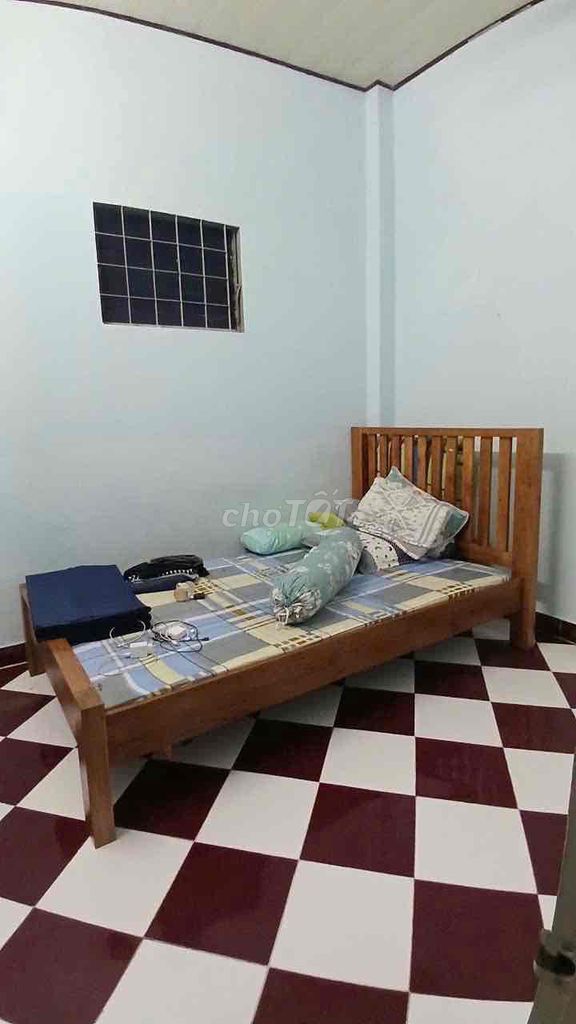The original house. It's 100 percent real. Two bedrooms. Two toilets. Nơ Trang Long. B. Happy