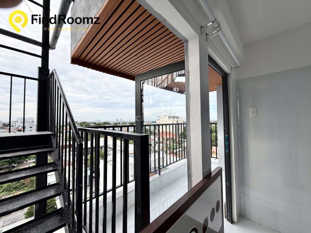The balcony is full of Vườn Lài furniture near the Iron Bridge.