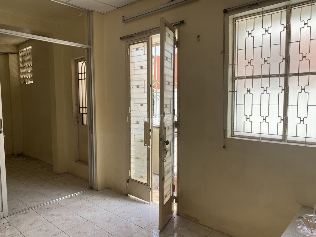 The room is like the one near the market. She understands there's her own bathroom, the balcony, her own clothes.