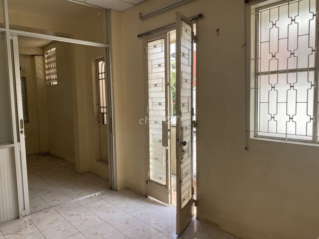 The room is like the one near the market. She understands there's her own bathroom, the balcony, her own clothes.