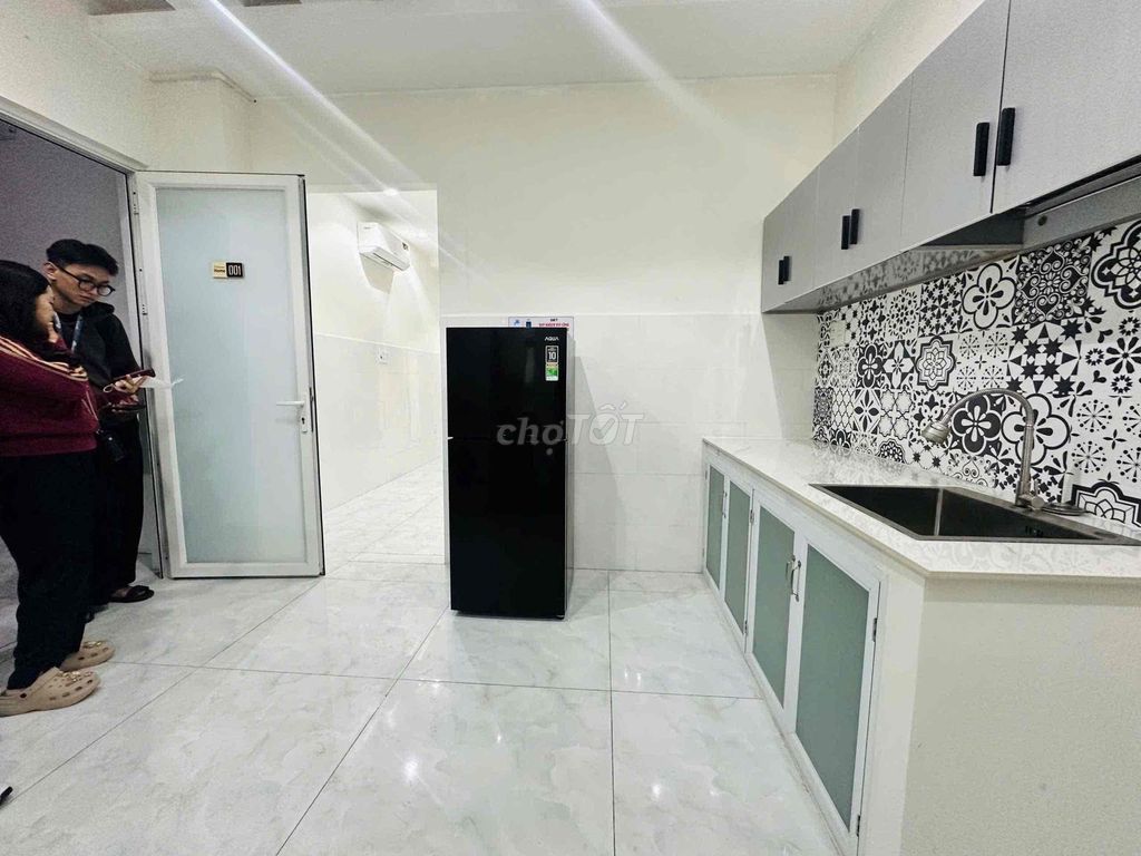 The mini apartment. A separate kitchen room, wide open.