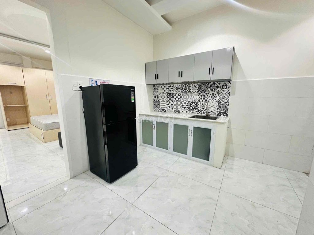 The mini apartment. A separate kitchen room, wide open.