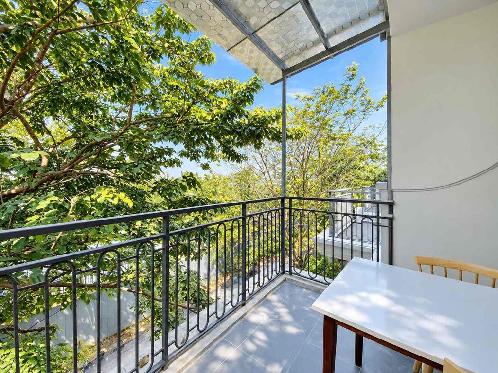 The apartment is a room with a wide bedroom full of facilities, where two and three people are.
