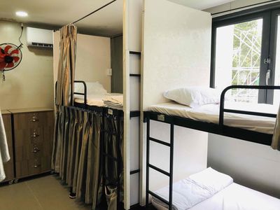 Bamboo's dorm is across from the University of Economics, District 10