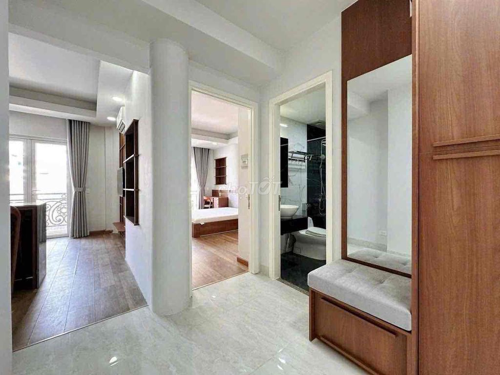 The apartment. A full bedroom. A balcony. In the center of Thảo Điền.