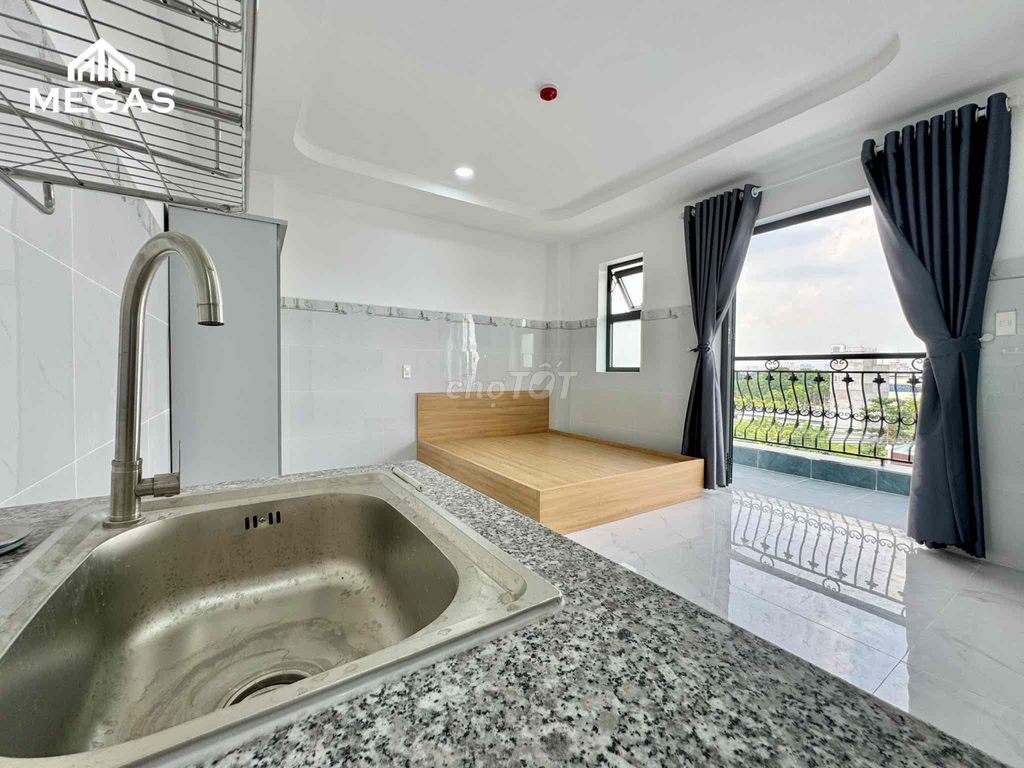 The balcony studio is right at the end of Nguyễn Thái Sơn.