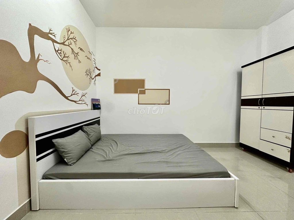 A low-cost hotel room full of airport furniture