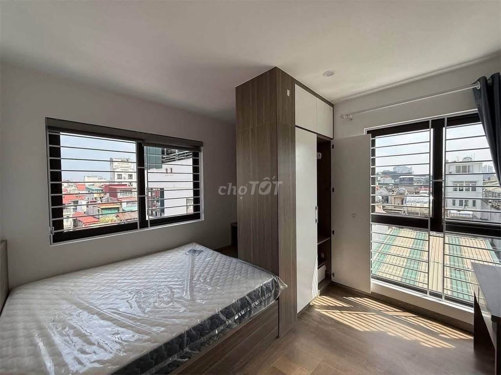 A niceBùi Đình Tuý-view bedroom with a private washing machine