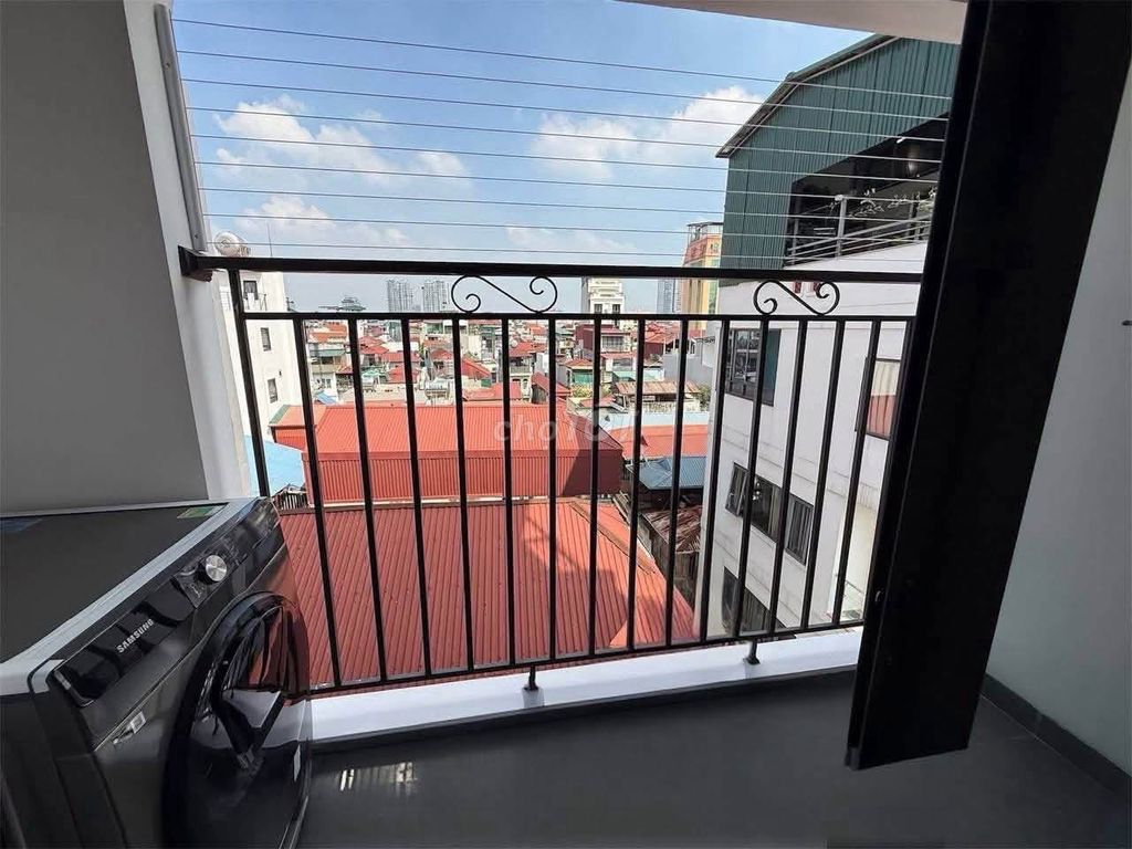 A niceBùi Đình Tuý-view bedroom with a private washing machine