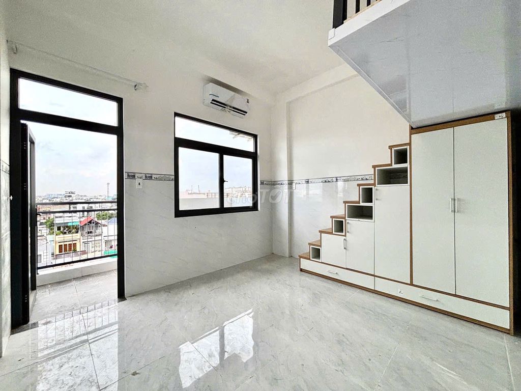 A full interior in the living room. Phan Văn Hớn has a newly built elevator.