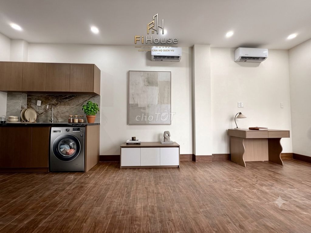 The kitchen split-view studio writes at the washing machine's view