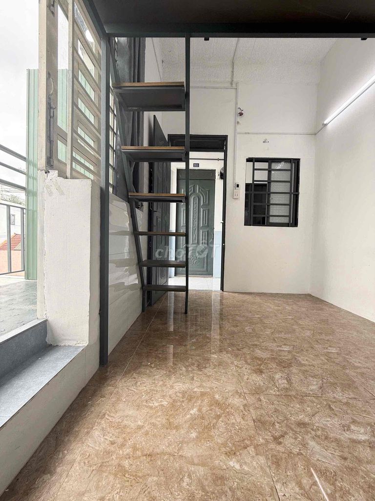The living room is located near Lê Trọng Tấn about 5 p drive from the huit and Aeon Tp