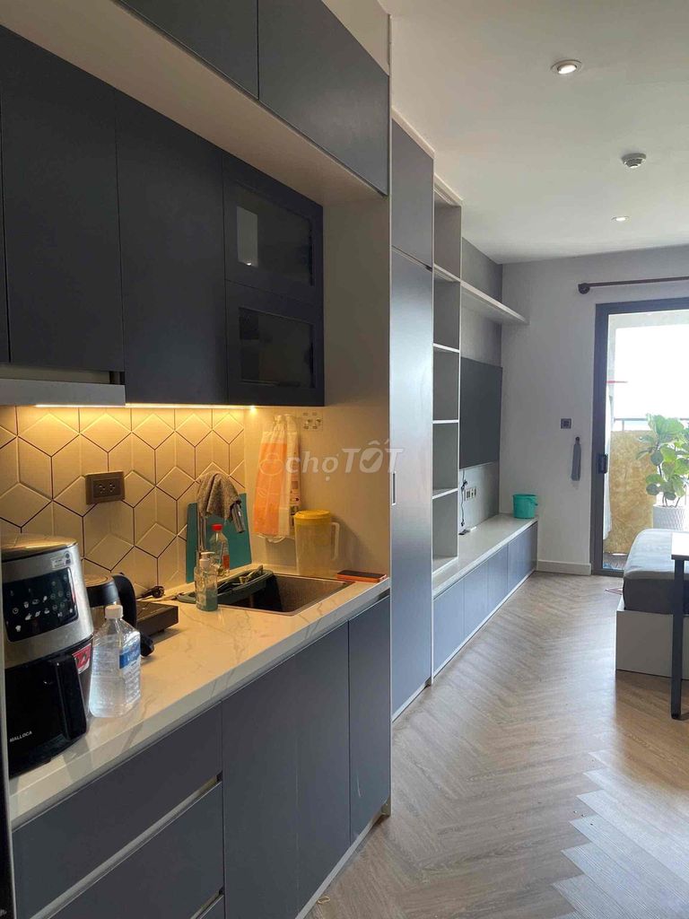 The studio apartment sees the Saigon Royal River full of furniture