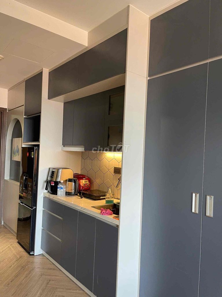 The studio apartment sees the Saigon Royal River full of furniture