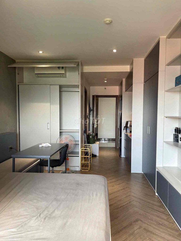 The studio apartment sees the Saigon Royal River full of furniture