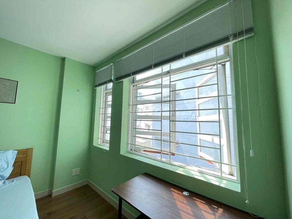 - Right here. - Right on District 1 - full of furniture only 5 million 500.