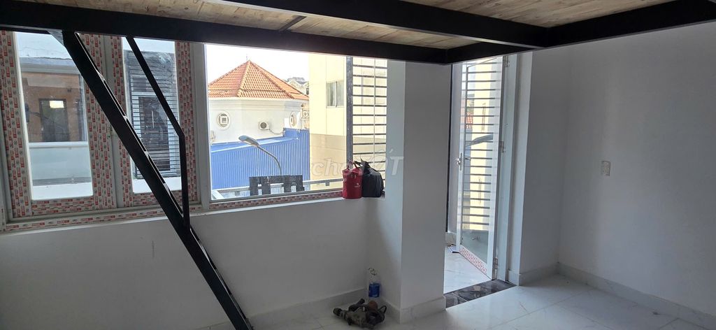 The balcony's got a beautiful panorama window.