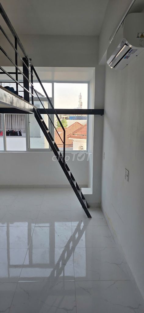 The balcony's got a beautiful panorama window.